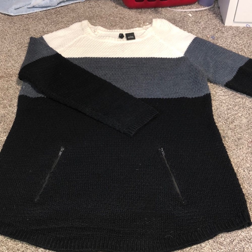 White grey and black sweater